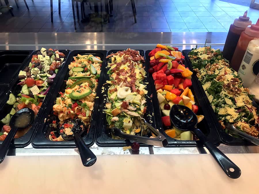 Salad trays: Greek, pasta, chicken Caesar, fruit and rocket salads